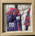 Purple House & Tree Quilted Wall Art is a captivating addition to any home decor.